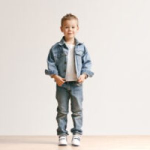 portrait-cute-little-kid-boy-stylish-jeans-clothes-looking-camera-against-white-studio-wall-300x200-1.jpeg